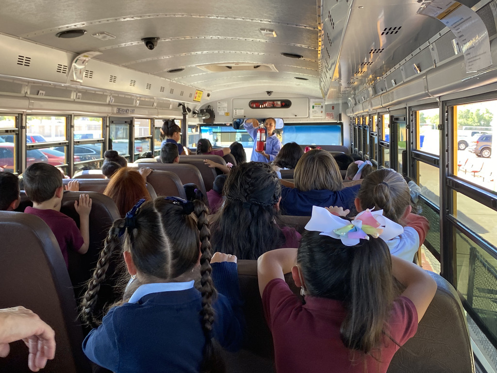 Students learn about bus safety and how to follow best practices in case of emergencies.