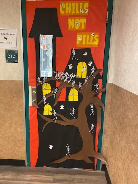 Photo of classroom door decorated for Red Ribbon Week