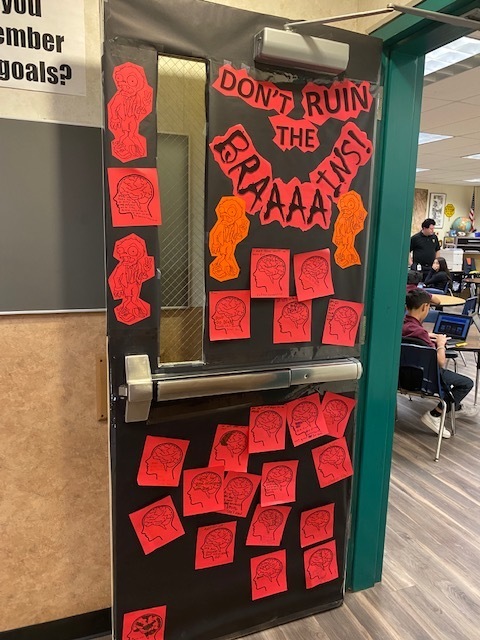 Photo of classroom door decorated for Red Ribbon Week