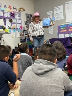 A reader from the Organization Kids Need to Read came to read to our Kinder through 2nd grade classrooms.